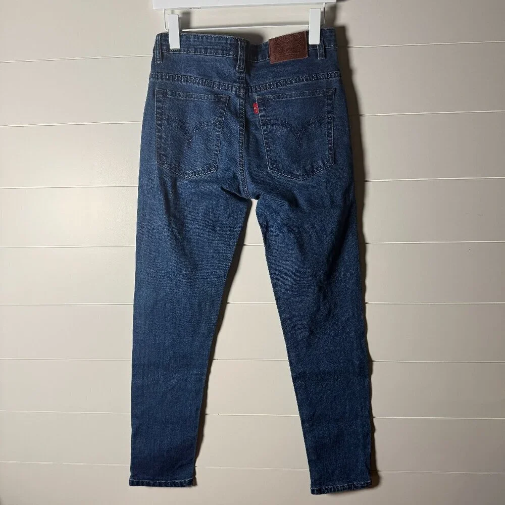 Levi's Jeans 30/34 Medium Wash Tapered Leg Leather Tag